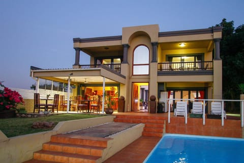 Property building, Swimming pool, Sunset