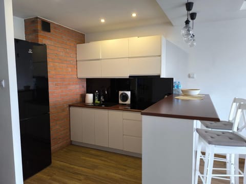 Kitchen or kitchenette, oven, stove