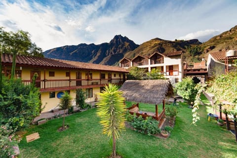 Property building, Natural landscape, Garden, Seating area, Garden view, Mountain view