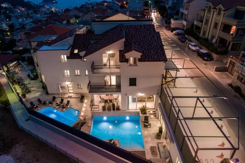 Property building, Patio, Night, Neighbourhood, Pool view, Street view, Swimming pool, sunbed