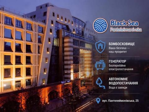 Property building, Property logo or sign, Logo/Certificate/Sign, Text overlay, City view, Street view