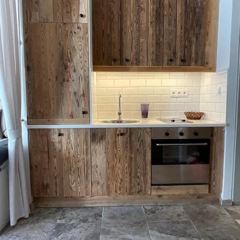 Kitchen or kitchenette, dishwasher, stove, kitchen