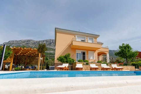 Property building, Patio, Day, Pool view