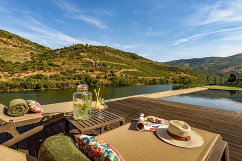 Nearby landmark, Natural landscape, Seating area, River view, Swimming pool, sunbed