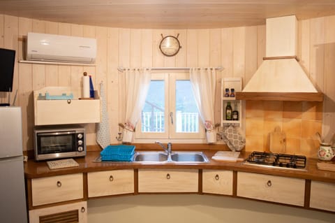 Nel verde del Villaggio - Casetta Celeste Apartment in Sardinia