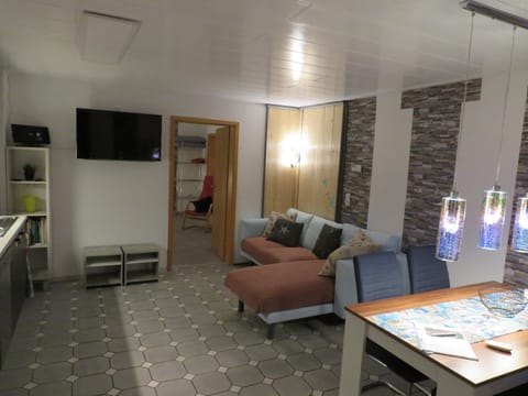 Kitchen or kitchenette, Living room, Seating area, Dining area