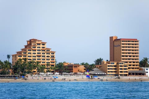 Property building, Nearby landmark, Natural landscape, Beach, Sea view