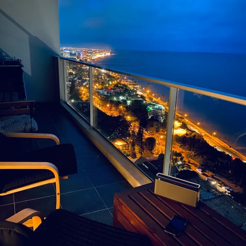 Night, View (from property/room), Balcony/Terrace, Living room, Sea view