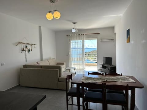 Natural landscape, TV and multimedia, Living room, Seating area, Dining area, Sea view