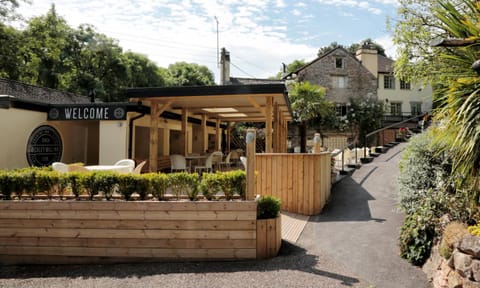 Property building, Patio, Restaurant/places to eat, Facade/entrance, Property logo or sign, Garden, Banquet/Function facilities, Garden view