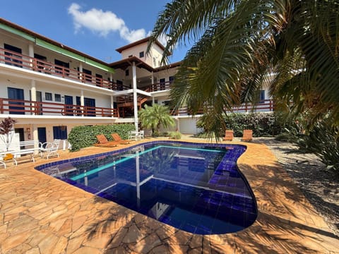 Property building, Day, Pool view, Swimming pool, sunbed