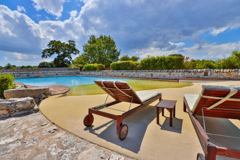 Swimming pool, sunbed