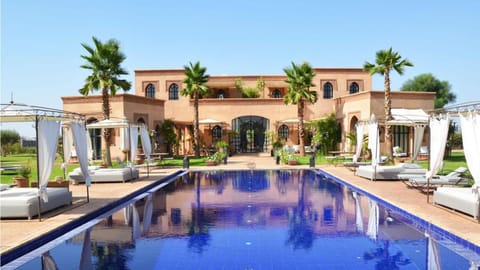 Patio, Facade/entrance, Garden, Garden view, Garden view, Landmark view, Pool view, Pool view, Swimming pool