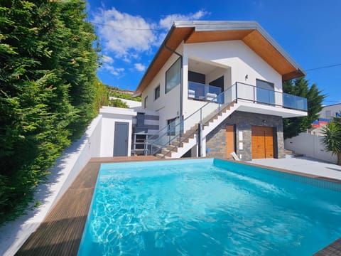 Property building, Patio, Day, Pool view, Swimming pool