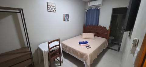 Bed, Photo of the whole room, Bedroom, towels, air conditioner