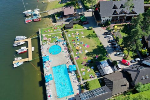 Property building, Natural landscape, Bird's eye view, Lake view, Pool view, Swimming pool