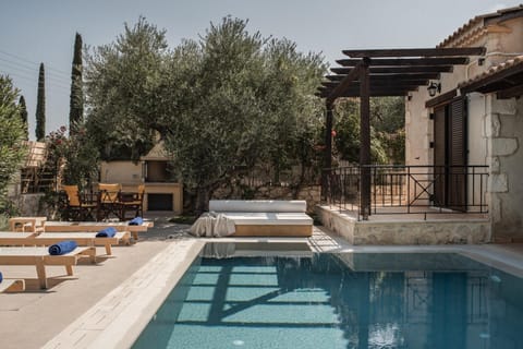 Property building, Patio, Pool view, Swimming pool, sunbed