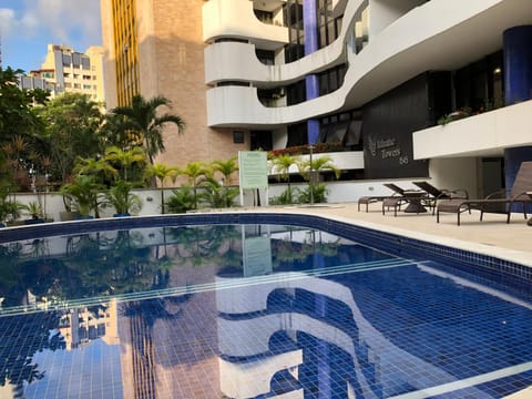 Property building, Patio, Pool view, Swimming pool, sunbed