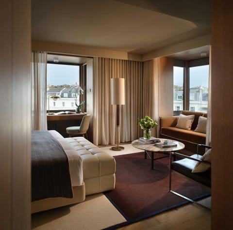 Bed, Living room, Seating area, Bedroom