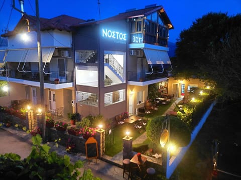Property building, Restaurant/places to eat, Night, Garden
