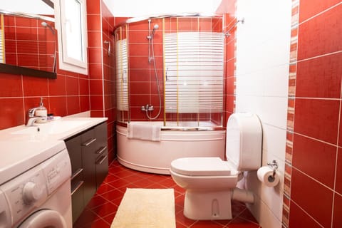 Toilet, Bathroom, towels, washing machine