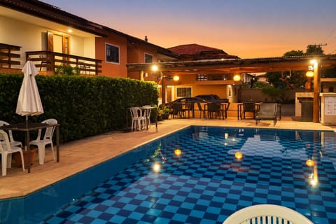 Property building, Patio, Day, Natural landscape, Pool view, Swimming pool, sunbed