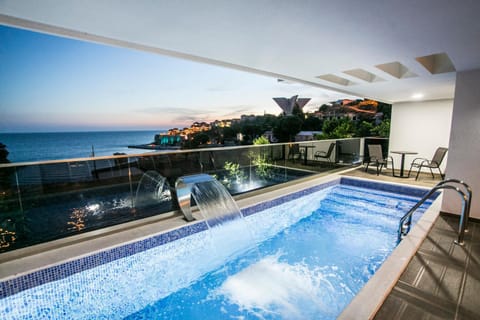 View (from property/room), Pool view, Sea view, Swimming pool, Swimming pool