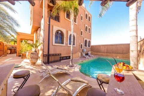 Property building, Patio, Day, View (from property/room), Pool view, Swimming pool