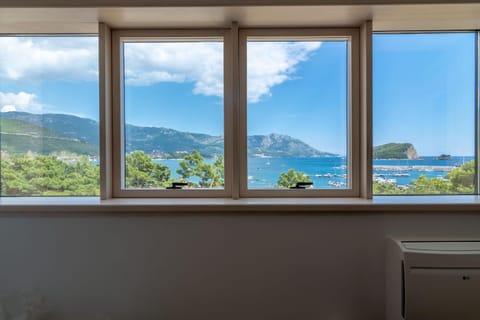 Living room, Seating area, Landmark view, Mountain view, Sea view