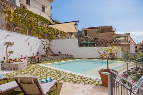 Property building, Patio, Garden, Pool view, Swimming pool