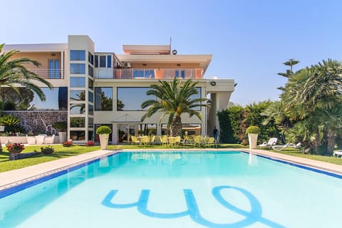 Property building, Facade/entrance, Garden, Pool view, Swimming pool, Swimming pool