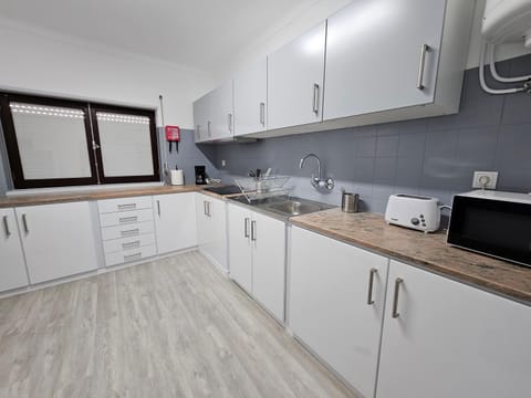 Kitchen or kitchenette, stove, toaster