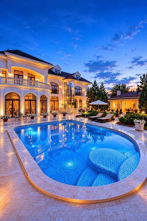 Property building, Night, Pool view, Swimming pool, sunbed