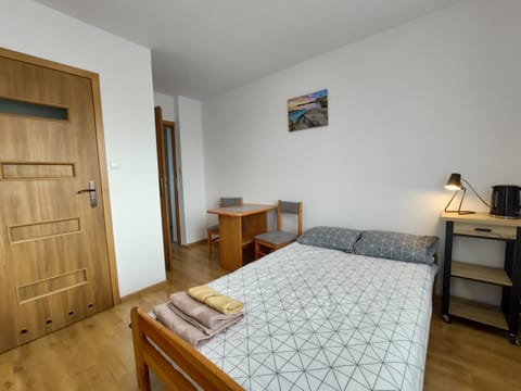 Bed, Photo of the whole room, towels, wardrobe
