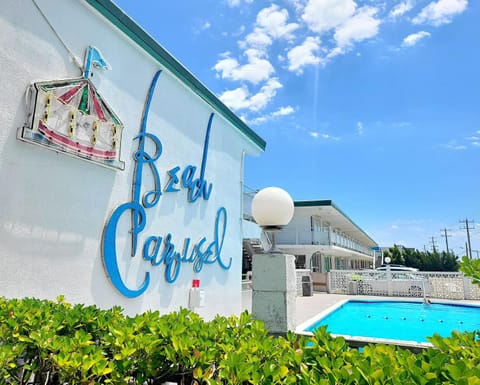 Property building, Property logo or sign, Swimming pool