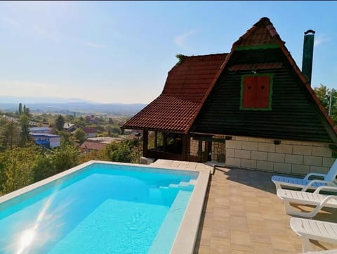 Property building, Pool view, Swimming pool, sunbed