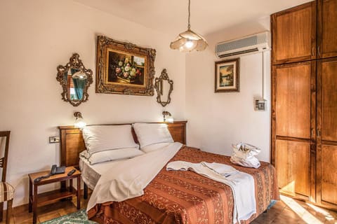 Bed, Bedroom, towels, wardrobe, air conditioner