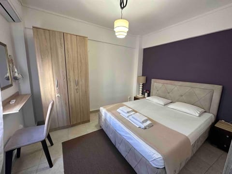 Bed, Photo of the whole room, Bedroom, hair dresser, towels, wardrobe