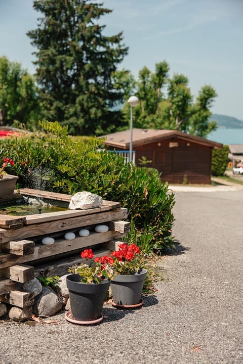 Camping Routes du Monde ATC Veyrier du Lac - Annecy Campground/ 
RV Resort in Menthon-Saint-Bernard