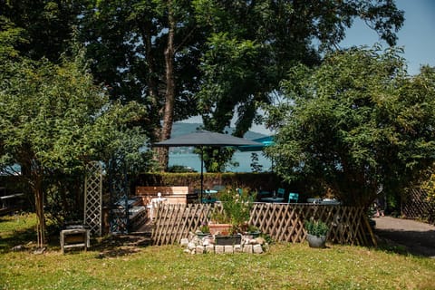 Camping Routes du Monde ATC Veyrier du Lac - Annecy Campground/ 
RV Resort in Menthon-Saint-Bernard