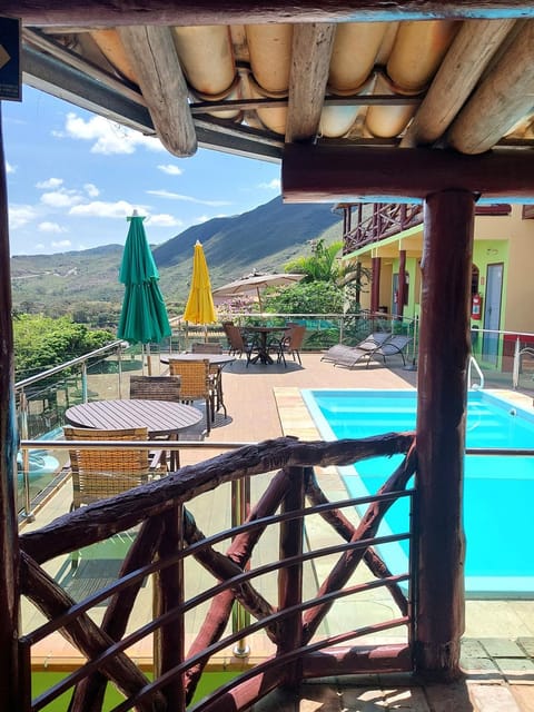 Property building, Patio, Day, Natural landscape, View (from property/room), Balcony/Terrace, Mountain view, Pool view, Swimming pool, sunbed