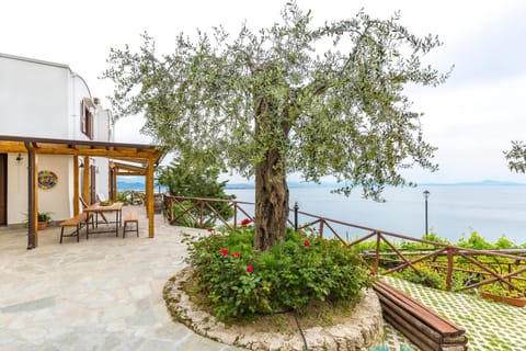 Property building, Patio, Spring, Day, Natural landscape, Garden, View (from property/room), Balcony/Terrace, Garden view, Sea view