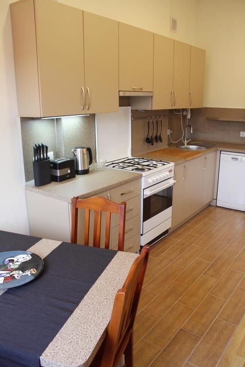 Kitchen or kitchenette, Dining area, dishwasher, oven, stove, toaster