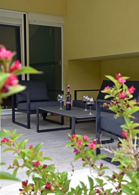 Patio, Seating area, Garden view, Pool view