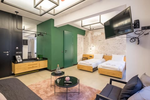 Bed, TV and multimedia, Seating area, Bedroom