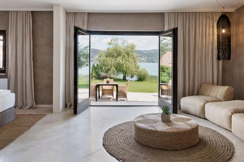 Natural landscape, Living room, Seating area, Garden view, Lake view