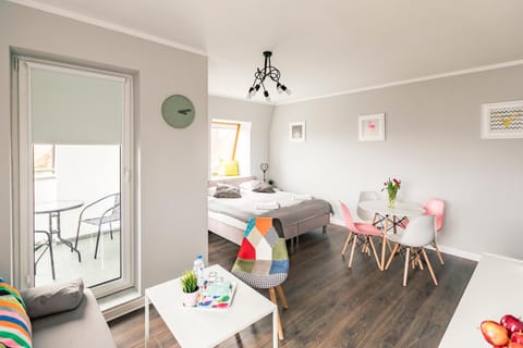 Bed, Living room, Seating area, Bedroom