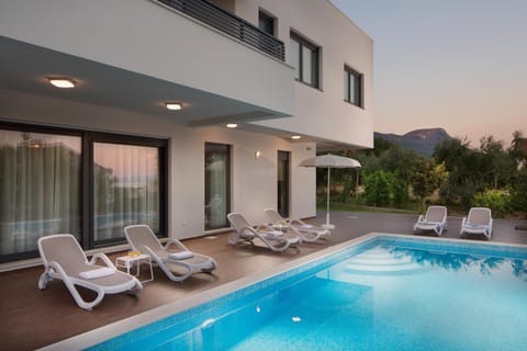 Property building, Patio, Swimming pool