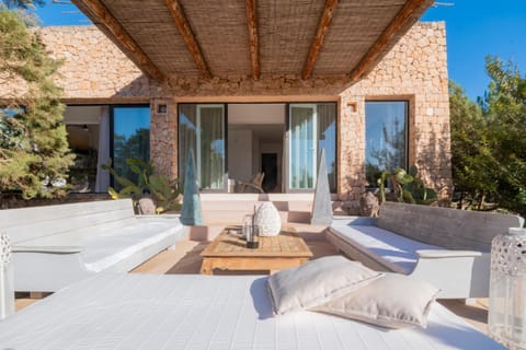 Property building, Patio, Living room, Seating area