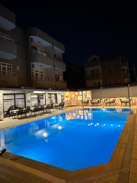 Property building, Night, Pool view, Swimming pool